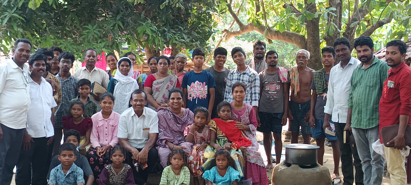 Village community gathered for the gospel day