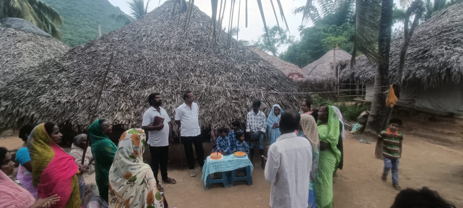 Community members gathered during outreach