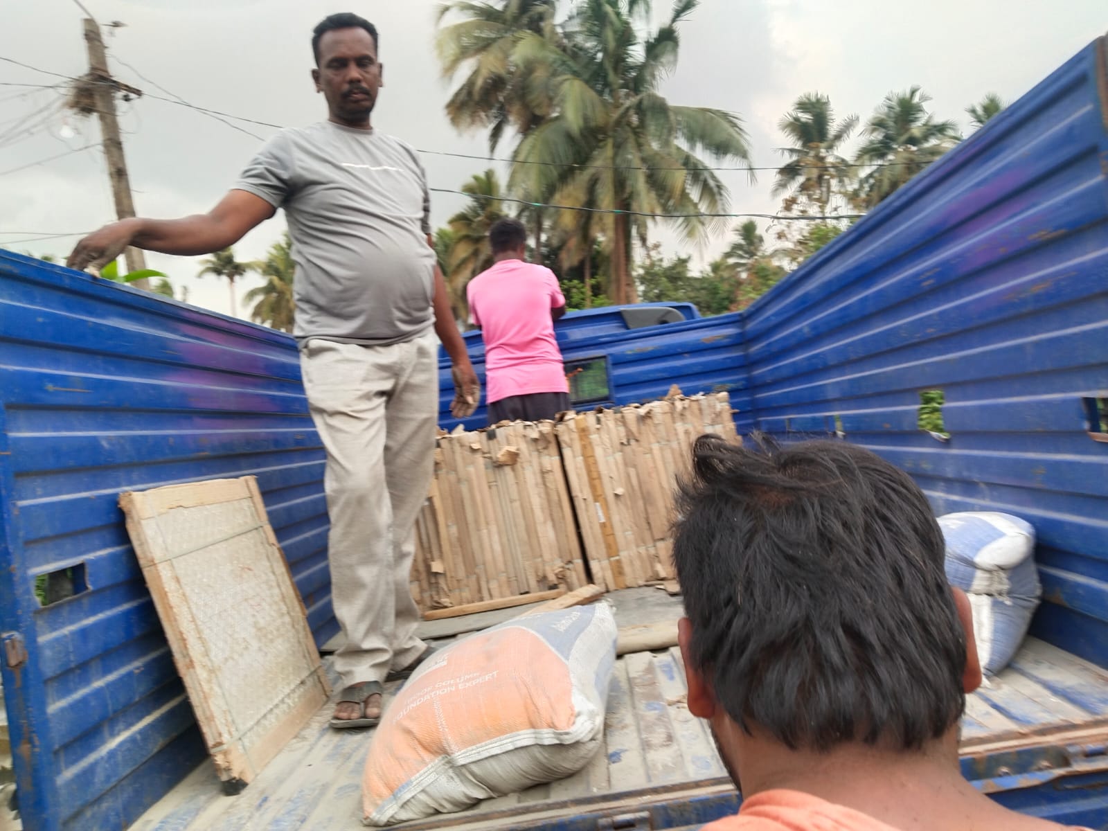 Materials being carried for church construction work