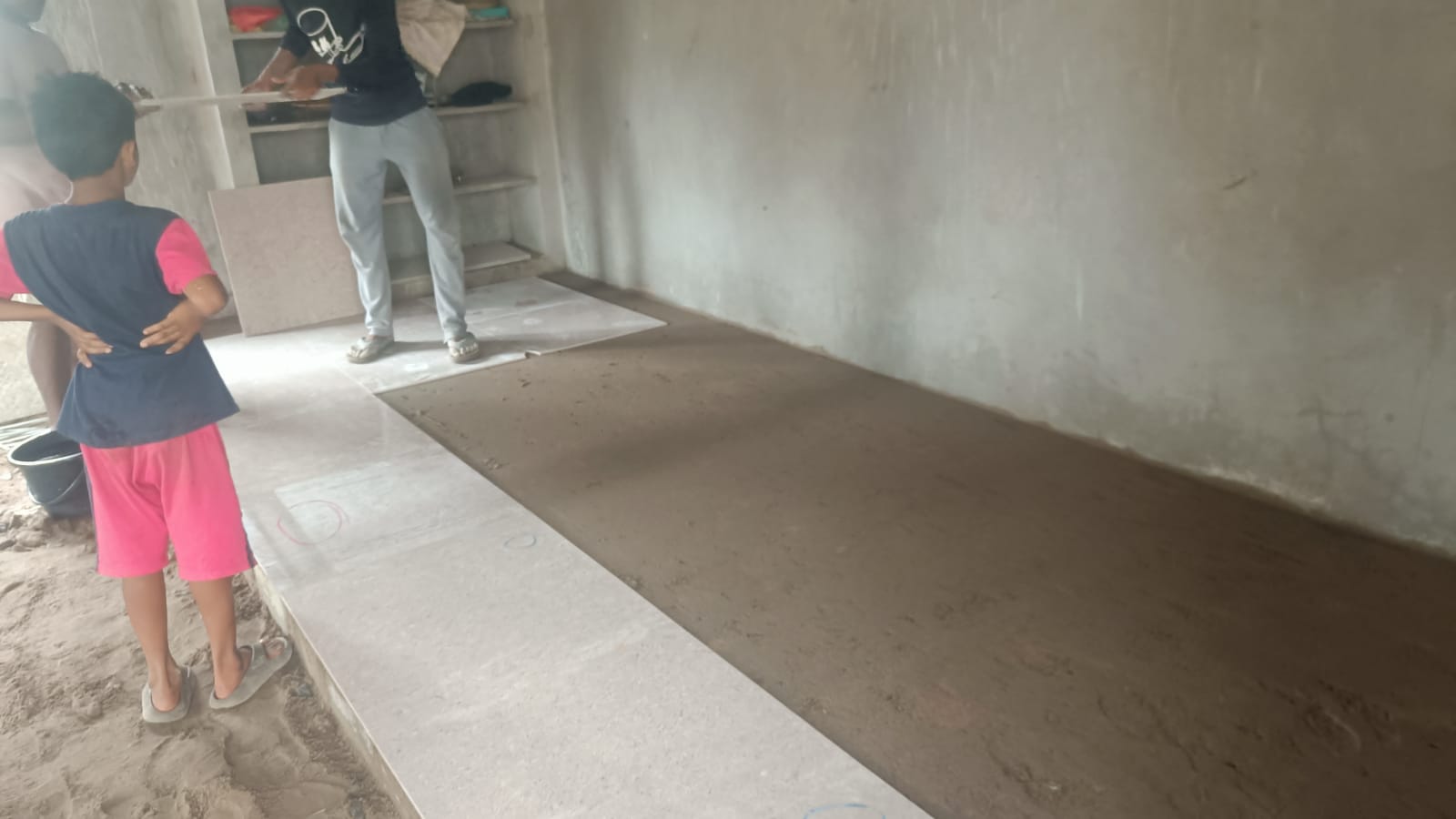 Materials being carried for church construction work