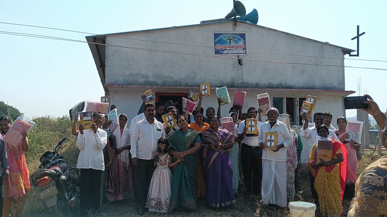 Pastors gathered during Christmas as each received a pair of clothes.